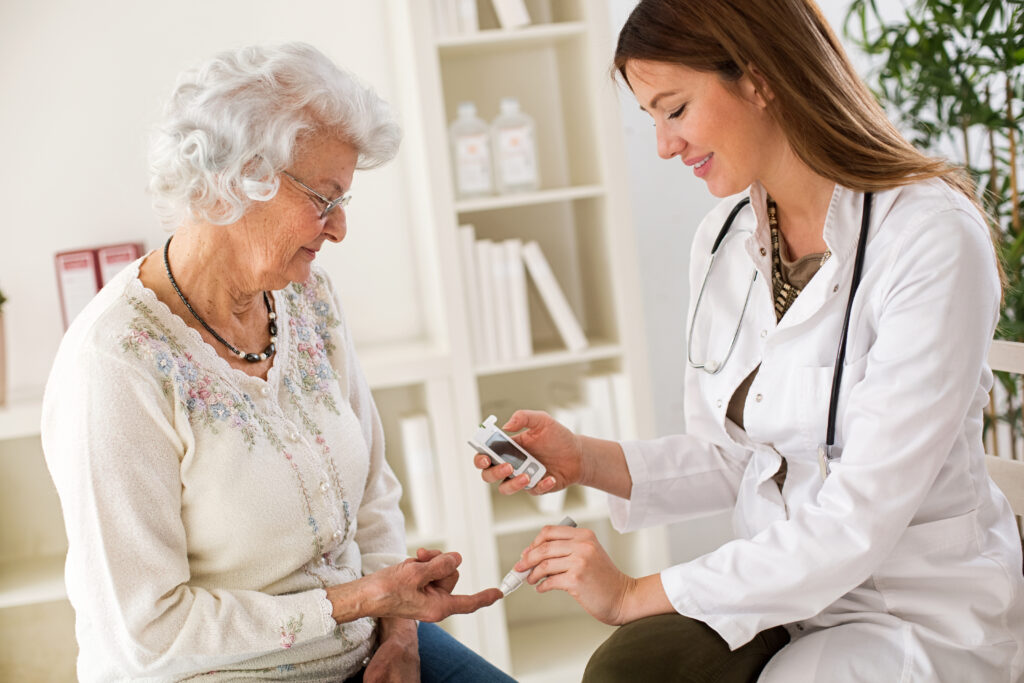 A female doctor conducting a test on an older patient